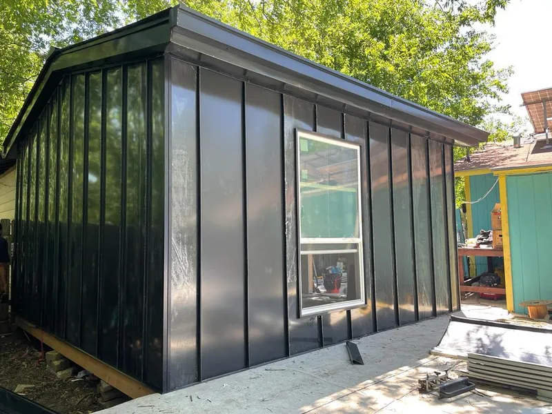 Black standing seam metal wall panels for Metal Roof Installation in Madisonville